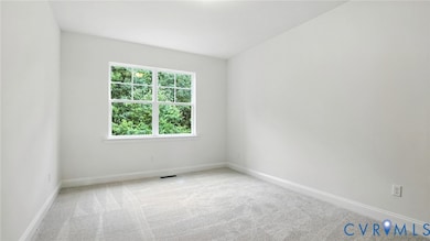 The first-floor guest suite with an ensuite bath. 
