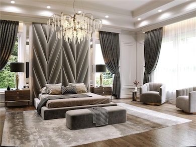 Bedroom with multiple windows, wood-type flooring, crown molding, recessed lighting, and a raised ceiling