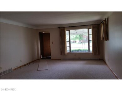Living room is huge! and great view out picture window. Sit on the front porch and watch the world go by!