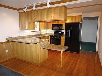 Huge EIK with work area & bright breakfast room...