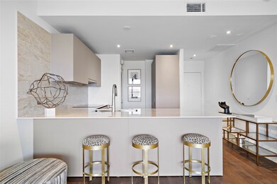 Ample breakfast bar with seating for up to five. C