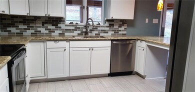 Ceramic Tiles and stainless appliances