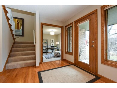Open light-filled foyer creates a beautiful entry 