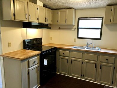 New stove and vent hood. New cabinetry hardware