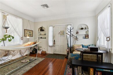 Living room; coved ceilings; original wood floors