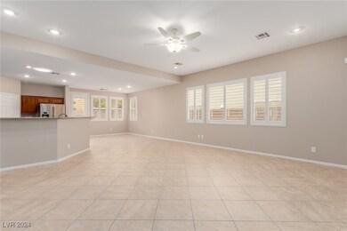 Unfurnished living room featuring ceiling fan, rec