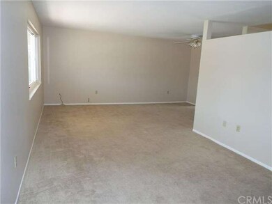 Living Room looking towards dining area with ceili
