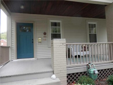 Exterior Front. Watch the world go by on this beau