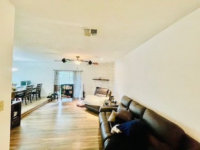 Large family room with fireplace and a backyard vi