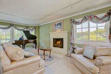 Formal living room with inviting fireplace