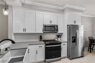 3965 Bishopwood Ct E unit 103, Naples, FL 34114 - photo 7