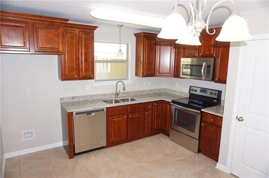 Wood Cabinets and SS Appliances!