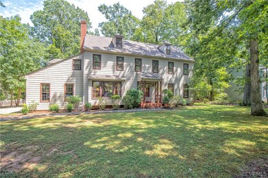 Comfortable traditional home with 4 bedrooms, inviting Family Room, and Florida Room!