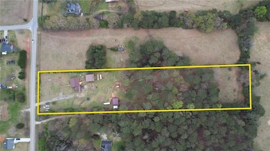 Birds eye view of property with a rural view