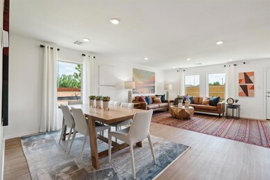 Dining room featuring plenty of natural light, woo