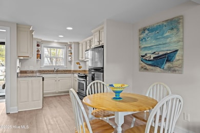 Dining Area Flows Into Kitchen