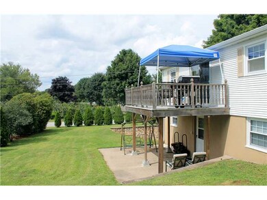 Exterior Back. Well maintained backyard with patio