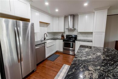 Newly remodeled kitchen with stainless appliances,