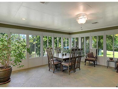 Photo. 390 sf heated/cooled sunroom not included in living area