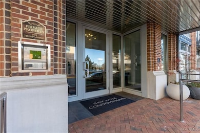 Property entrance with brick siding