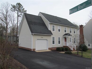 Front left view showing newer blacktop circular dr