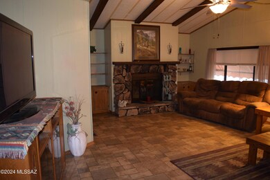 Living room with wood burning fireplace