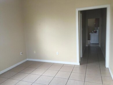 Living room. Bedroom 1 is first door on the left i