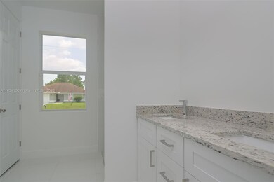 6019 Ruth Ave N, Lehigh Acres, FL 33971 - photo 6