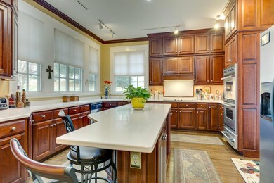 Cherry cabinetry by Derryberry. Corian Counter tops. Viking double oven with warming oven 