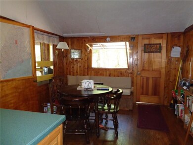 View of dining area and door to...