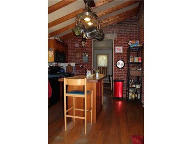 Kitchen. Charming kitchen with island and oak hard