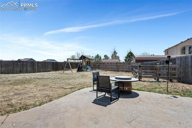 View of patio featuring a playground