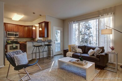 Living room with upper deck assess