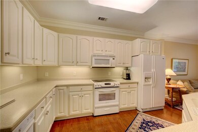 Open kitchen with plenty of storage space.