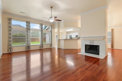 The spacious family room has crown molding, ceilin