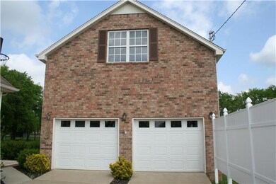 DETACHED GARAGE/SHOP THAT IS 30X24 WITH A DRIVE OU