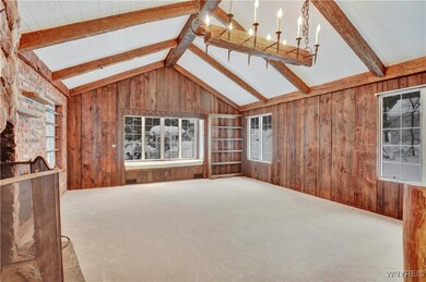 Family room towards rear of home, brand new carpet