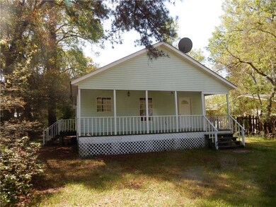 FRONT VIEW OF HOUSE, VINYL, METAL ROOF