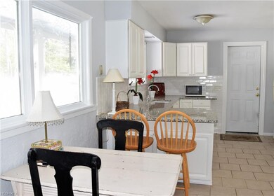 The kitchen includes space for a kitchen table in 