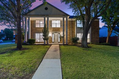 View of front of property featuring a lawn