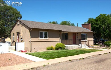 Ranch-style house with  stucco siding