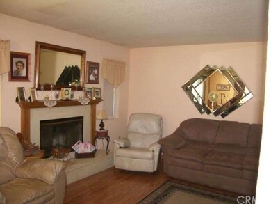 Family room with fireplace.
