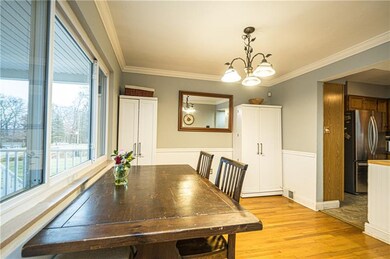 Dining room open to kitchen; butcher block island 