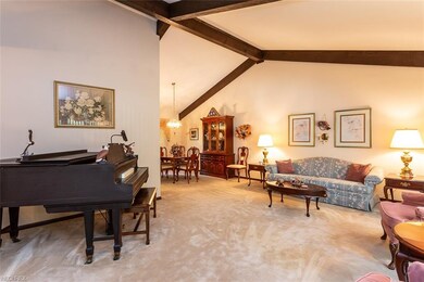 Spacious living room and formal dining with cathed