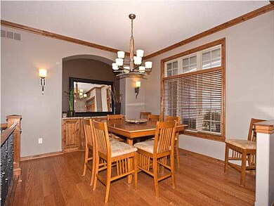 Formal dining room has alcoved buffet with granite
