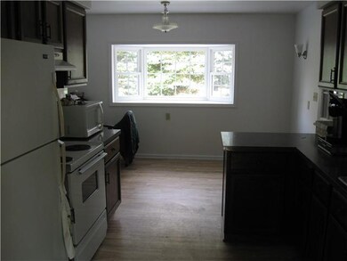 Kitchen Big bay window lights up the open eat-in s