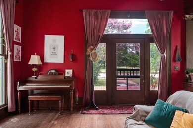 Doorway featuring wood finished floors
