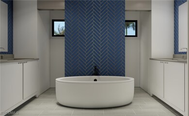 Full bathroom with a freestanding tub, tile walls,