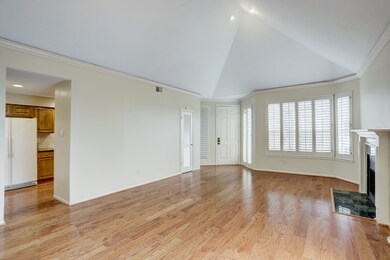 Another view of the pretty living room and kitchen