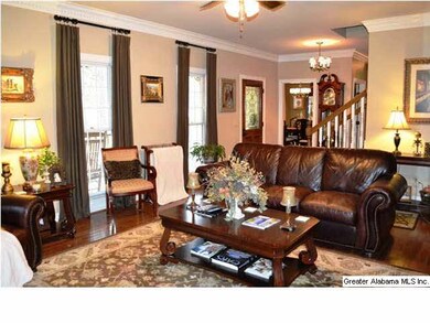 Large living room with 9 ft ceilings, dentil crown